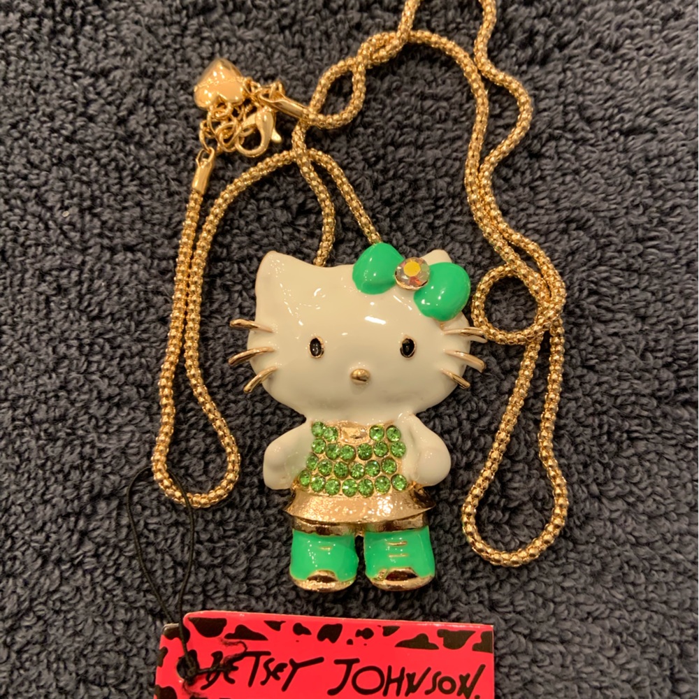 On sale!  BJ Hello Kitty necklace, mint green dress, bow in hair.  Drop is 12”